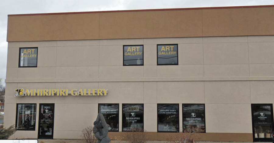 Mhiripiri-Gallery-Bloomington-exterior Exterior of Mhiripiri Gallery with the gallery name displayed above the entrance and "Art Gallery" signs in the upper windows. The storefront helps visitors recognize the gallery when arriving at its Bloomington Minnesota location.